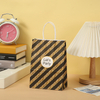 Wholesale Custom Logo Silver Stamping Fashion Shopping Wrapping Coated Paper Gift Shopping Packaging Bag with Handle Rope for Festival