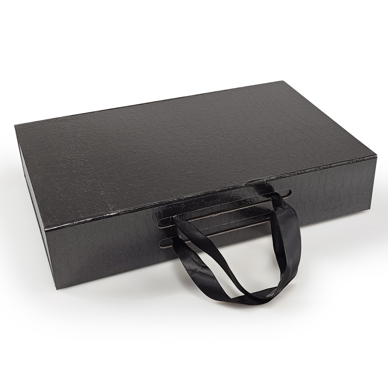 Hot Selling Ribbon Handle Folding Paper Packaging Carton Gift Box