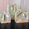 China Manufacturer Wholesale Paper Packaging Gift Bags With Ribbon Closure