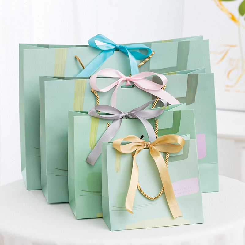 The Art of Gifting: Why Our Mint Green Paper Tote Bags Are A Must-Have for Modern Brands & Events